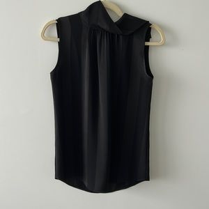 Ann Taylor black silk sleeveless top with high collar and striped pattern